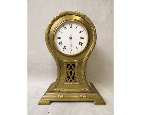 A gilt brass cased mantle clock with white enamelled Roman dial, circa 1900