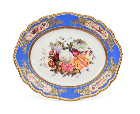 A Chamberlain's Worcester charger  c.1840, the well finely painted with an arrangement of flowers including lilac, passionflo