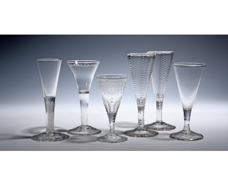 Six wine or ale glasses  c.1760-80, a pair of flutes with vertical cut bands, a drawn trumpet over a double series opaque twi