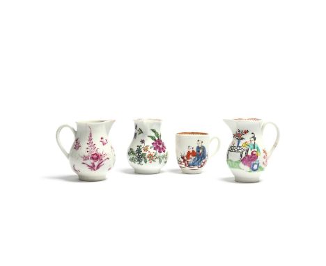Three Worcester milk jugs  c.1760-70, one painted with a Chinese figure seated at a table, another with a bold spray of Orien