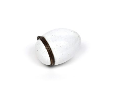 A Bilston enamel egg-shaped bonbonnière c.1770, unusually left in the white, with metal mounted hinged cover, 4.4cm. Paper la