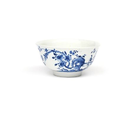 A Worcester blue and white slop bowl  c.1755-58, painted with the Prunus Fence pattern, of flowering branches before holey ro