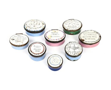 Eight English enamel patch boxes  c.1760-80, of oval and circular form, variously painted and printed with inscriptions inclu
