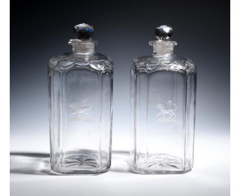A massive pair of Irish cut glass decanters and stoppers  c.1800, of double magnum size, the chamfered square forms engraved 