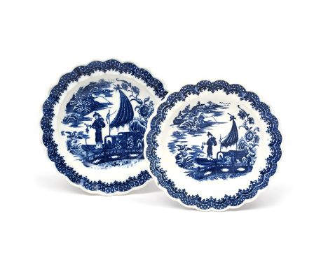 Two Caughley blue and white plates  c.1770-80, printed with the Fisherman and Cormorant pattern within scalloped cell diaper 