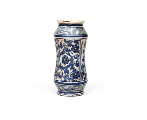 A Portuguese maiolica albarello  c.1675, the waisted form painted with panels of flowering branches in blue with ochre highli