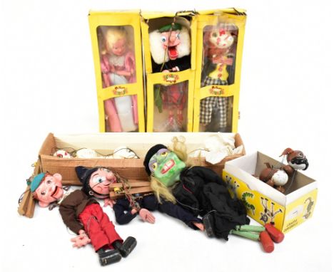 A collection of eight Pelham Puppets comprising skeleton, Cinderella, Macboozle, Bimbo, Bengo, each boxed, with an unboxed wi
