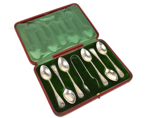 MARK WILLIS &amp; SONS; a set of six Victorian hallmarked silver tea spoons and sugar tongs, with foliate cast handles, in fi