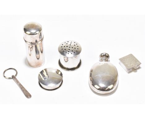 A group of small silver including a George V hallmarked silver miniature hip flask, Birmingham 1923, height 8.5cm, a cylindri