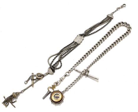 A hallmarked silver curb link pocket watch chain suspending a white metal fob set with compass to obverse and equestrian to r