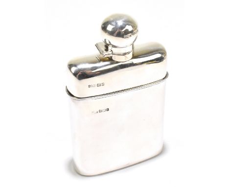 JAMES DIXON &amp; SONS; a George V hallmarked silver and clear glass hip flask, with slide-off base section and hinged cap, S