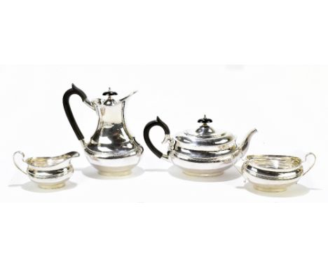 VINERS LTD; an Elizabeth II hallmarked silver four piece tea set, each of oval form with chased detail to the lower body, She