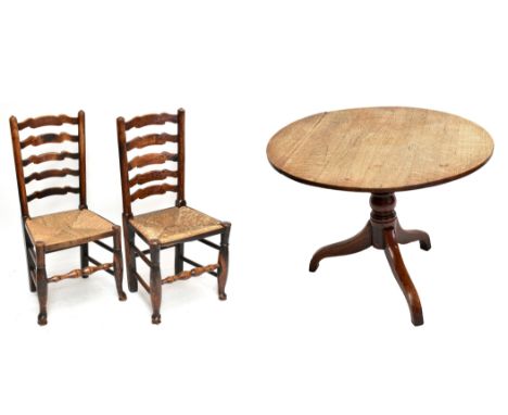 A late George III oak tripod table with bleached circular top, diameter approx. 90cm, and four wavy ladder back chairs (5).