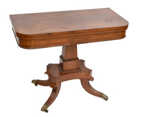 A Regency mahogany fold over card table with two step column on a platform and hipped legs, height 72cm, width 91.5cm, depth 