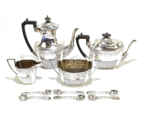 WALKER &amp; HALL; a Victorian and Edward VII hallmarked silver four piece tea set, comprising teapot with ebonised handle, l