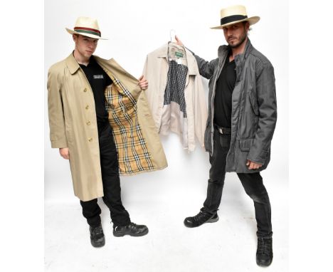 BURBERRY; a vintage Nova Check beige trench coat with button front, two side slip pockets, and fully lined, size Reg, an Arma