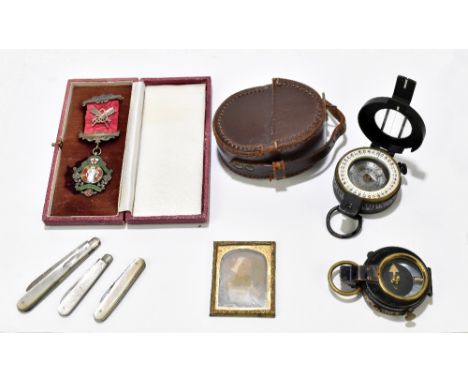 A mixed lot of collector's items to include two military compasses, each with crow foot, the large example boxed, two mother 