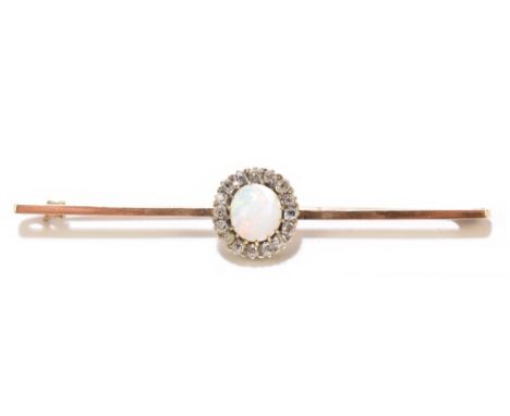 A yellow metal and opal and diamond bar brooch, the central opal cabochon set within a border of sixteen old cut diamonds, le