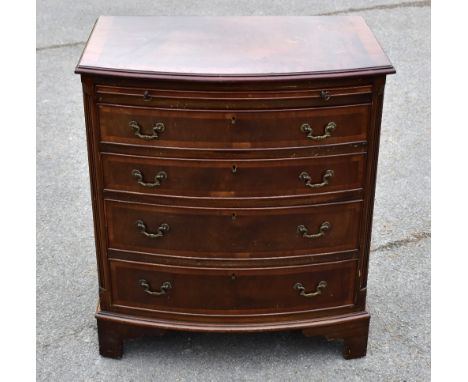 A George III style reproduction mahogany bowfront chest, with brush slide and four graduated long drawers on bracket feet, he