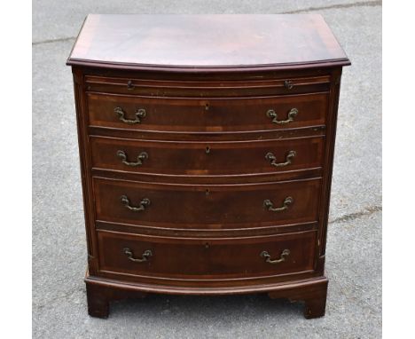 A George III style reproduction mahogany bowfront chest, with brush slide and four graduated long drawers on bracket feet, he