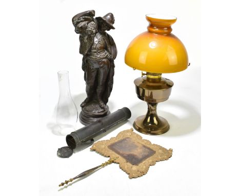 A late Victorian oil lamp, the cranberry and milk glass reservoir with moulded floral decoration, with clear and frosted glas