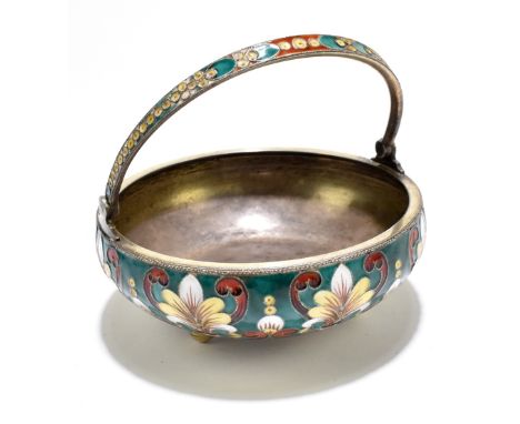 A Russian 916 standard silver and enamel basket, with swing handle and decorated with foliate motifs against a green ground, 