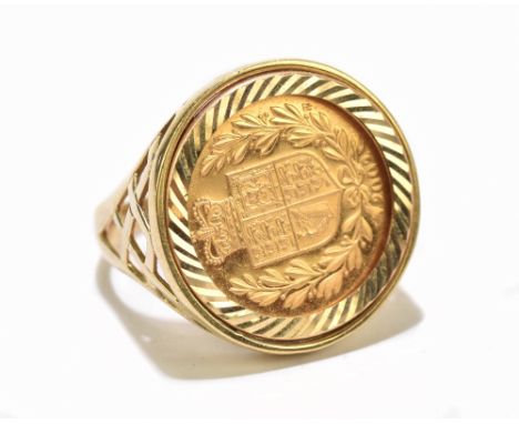 An Elizabeth II full sovereign, 2002, in 9ct gold ring mount, size X, approx 14.3g.