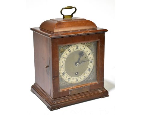 A mid-20th century walnut mantel timepiece, with Roman numeral chapter ring above a plate which is engraved 'Imperial Commerc