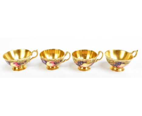 N. BRUNT &amp; D. JONES FOR AYNSLEY; four hand painted tea cups decorated with fruit, diameter of largest example 13cm.Additi