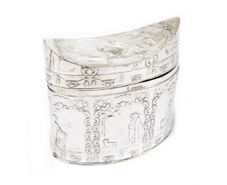 An Edwardian Dutch imported silver tea canister, with convex hinged lid and allover embossed decoration featuring figures and