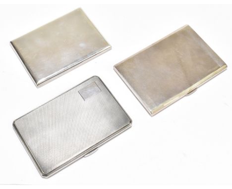 W.T. TOGHILL &amp; CO; a George V hallmarked silver cigarette case of rounded rectangular form, inscribed to the interior 'To
