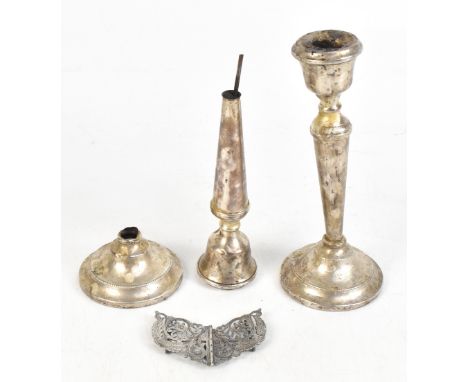 A T CANNON LTD; a pair of Elizabeth II hallmarked silver candlesticks, with cast beaded foot rims, Birmingham 1967, (filled) 
