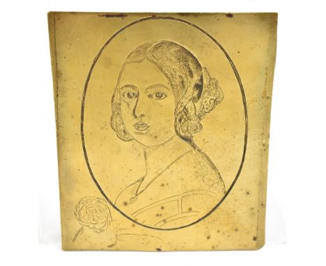 An 18th century gilt brass panel chased with a portrait bust beside a rose to the corner, at the reverse with an arrow throug