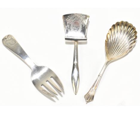 WILLIAM PUGH; a George III hallmarked silver caddy spoon of shovel form, the bowl with bright cut decoration of an oval carto