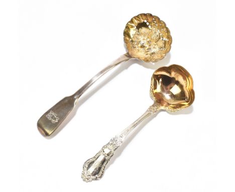 SAMUEL HAYNE &amp; DUDLEY CATER; a William IV hallmarked silver sifting spoon, the shaped oval bowl with repoussé and gilt de