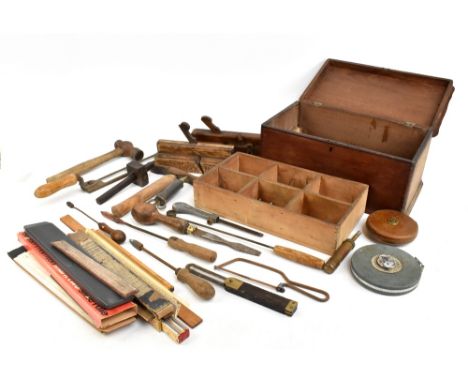 A collection of assorted tools to include woodworking planes, a chisel, together with a stained teak tool chest.