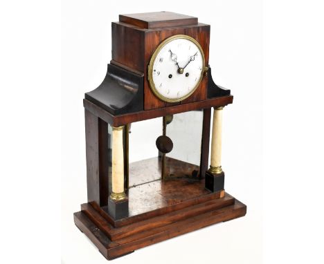 A late 19th century French burr walnut and ebonised portico clock, the circular enamelled dial with Arabic and Roman numerals