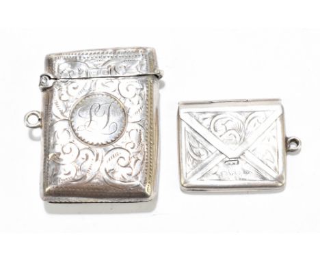 An Edward VII hallmarked silver vesta case, Birmingham 1907 (makers mark's rubbed), and a single stamp box, Chester 1914 (mak