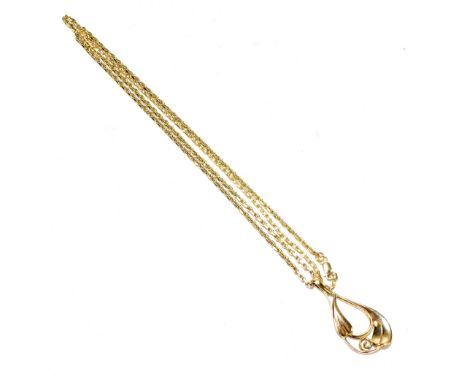 A 9ct yellow gold fine link chain supporting a 9ct yellow gold open work pendant, length of chain 66cm, length of pendant inc