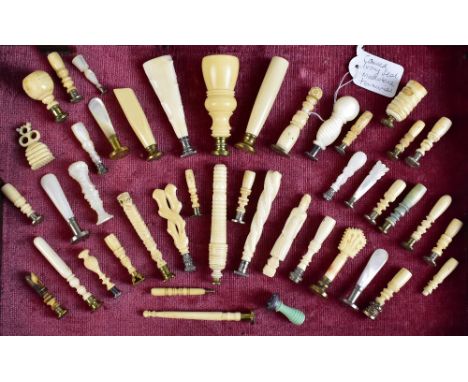 A collection of forty-three 19th&nbsp;and early 20th&nbsp;century ivory, bone and mother of pearl seals, to include one model