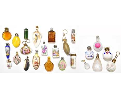 A collection of twenty one 19th&nbsp;century and later scent bottles and stoppers, to include a spade shaped ceramic scent bo