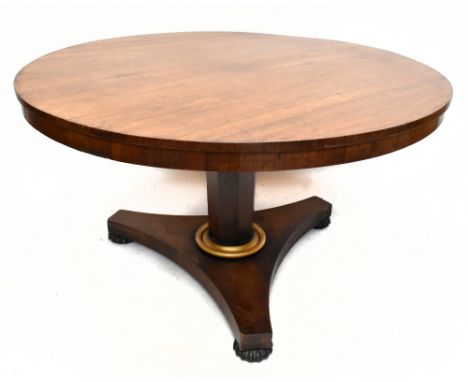 A William IV rosewood circular breakfast table, with a tapering octagonal column and gilt lower section, on triangular platfo