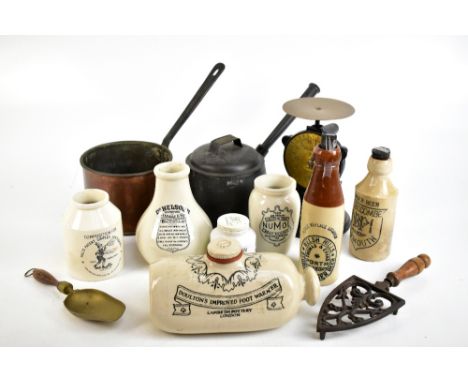 A collection of 19th century and later metalware to include a copper sauce pan, an iron saucepan and metal cover, a herb chop