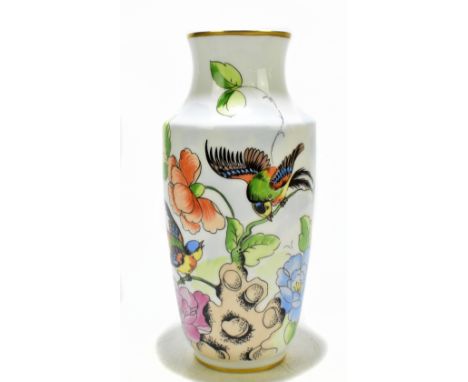 LIMOGES; a 'Jacques' limited edition hand painted vase decorated with birds perched amongst flowering branches, with gilt rim