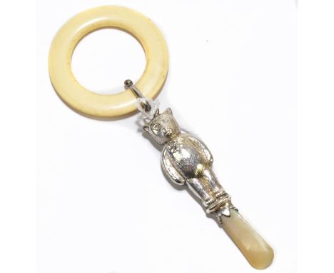 W H COLLINS &amp; CO; an Elizabeth II hallmarked silver and mother of pearl handled teddy bear rattle with teething ring, Bir