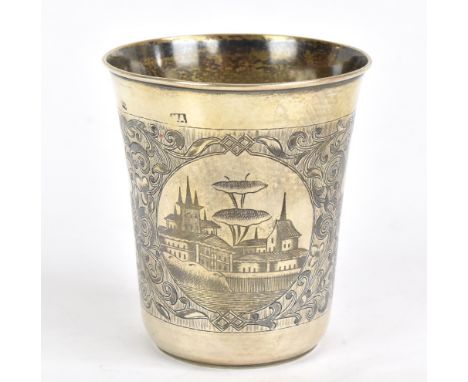 A 19th century Russian&nbsp;hallmarked silver 84 Zolotnik and niello beaker, decorated with two circular views of buildings i