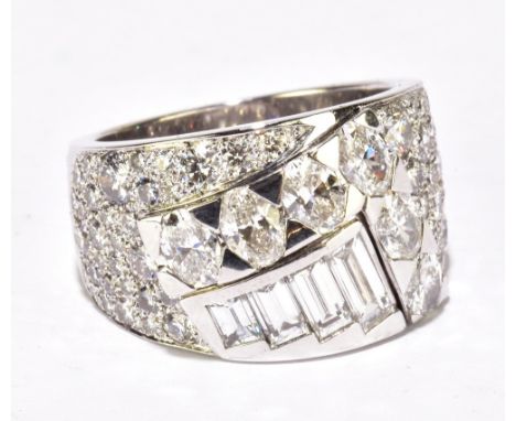 DE BEERS; an 18ct white gold and diamond 'So Chic' ring set with seventy nine variously cut and sized diamonds in an abstract