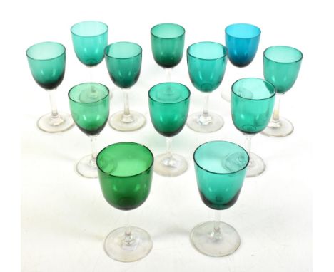 A matched set of twelve Victorian wine glasses with green bowls and clear stems.Additional InformationSome light fritting, et