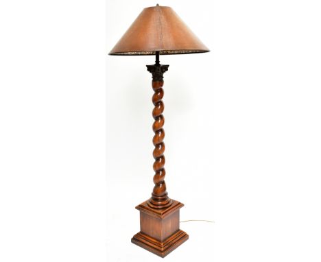 ATTRIBUTED TO THEODORE ALEXANDER; a contemporary barley twist standard lamp with corinthian capital.