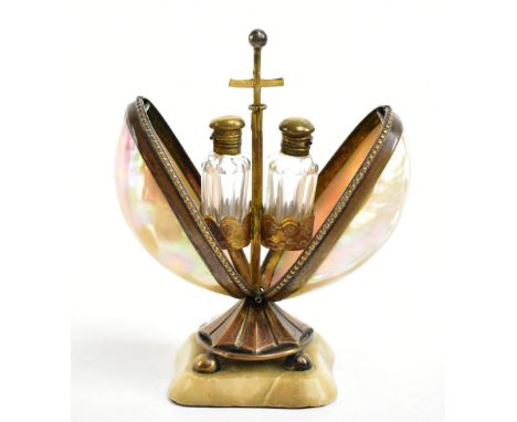 A Victorian gilt brass and mother of pearl shell egg shaped scent bottle case, the interior enclosing two scent bottles and h
